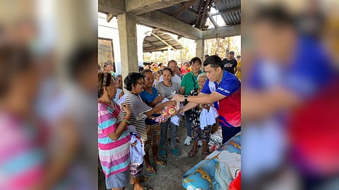 SENATOR Bong Go’s Malasakit Team distributes aid to families affected by typhoon ‘Uwan’ in Agno, Pangasinan. He also emphasized the need for permanent evacuation centers and stronger support for frontline responders.