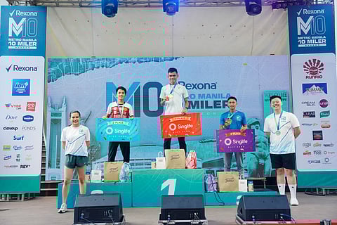 EDUARD Flores (middle) celebrates after winning the men’s 16K race in thrilling fashion during the Rexona Metro Manila 10 Miler Series 2025 on Sunday at UP Diliman Grounds.