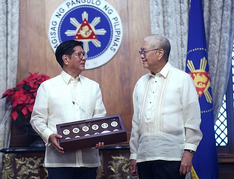 Bangko Sentral ng Pilipinas (BSP) Governor Eli M. Remolona presents the 100-Piso Philippine Festivals Commemorative Coin Series and the 10-Peso ASEAN Coin to President Ferdinand Marcos Jr. at Malacañang Palace.