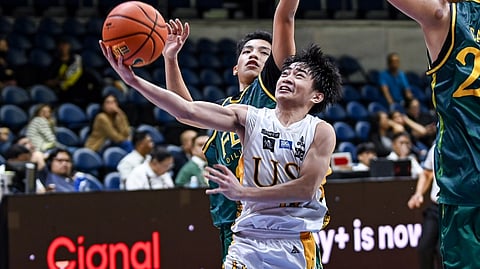 ROWIE Cabañero stands tall, firing a triple-double performance to lead the UST Tiger Cubs to a 108-70 rout of the FEU-D Baby Tamaraws in the UAAP Season 101 junior high school basketball tournament on Wednesday.    