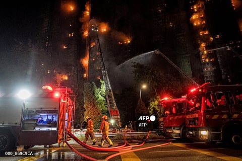 Hong Kong fire death toll rises to 13: government