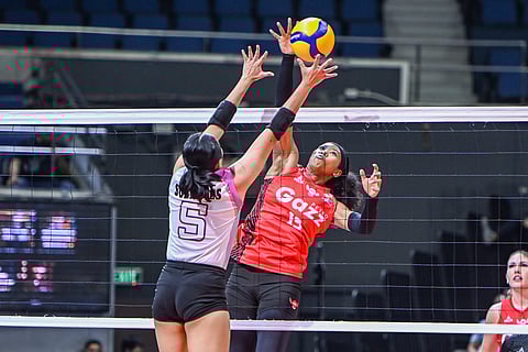 MJ Phillips of Petro Gazz challenges the defense of Gretchel Soltones of Akari during their PVL Reinforced Conference semifinal showdown on Thursday. The Angels won,  25-19, 25-17, 15-25, 22-25, 15-13.