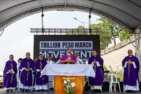 Cardinal Pablo Virgilio David presides over Mass during the “Trillion Peso March” at the People Power Monument in Quezon City on Sunday. 