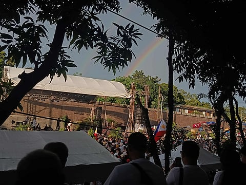 A rainbow graced the “Trillion Peso March” at the People Power Monument on Sunday after a short but heavy rainfall in the area.