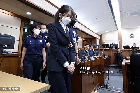 SKOREA-POLITICS-CRIME-TRIAL
South Korea's former first lady Kim Keon Hee (C) arrives for her first trial hearing on corruption charges at the Seoul Central District Court in Seoul on September 24, 2025. Kim Keon Hee, wife of jailed former South Korean President Yoon Suk Yeol, was indicted August 29 on charges including bribery, stock-market rigging, and accepting luxury gifts worth more than $50,000, a special prosecution team said.