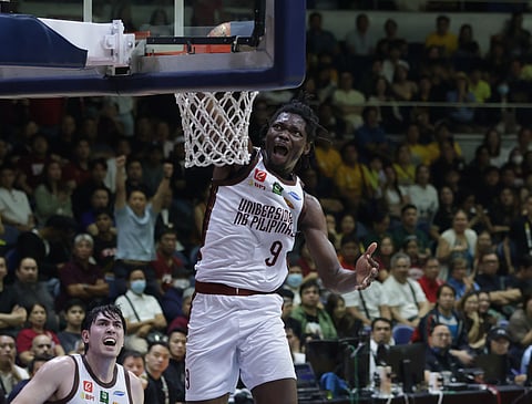 Francis Nnoruka asserts his dominance to lead the UP Fighting Maroons to a thrilling 82-81 victory over the UST Growling Tigers in the Final Four of the UAAP Season 88 men’s basketball tournament.