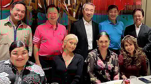 CHINABANK Corporation chairman Hans Sy (standing, third from left) comes to Early Mother’s Day lunch with Michelle Dee and Melanie Marquez (seated, second and third from left). Also with Mr. Sy are (standing, from left) Jerry Tiu, Johnip Cua, Joseph Chua, and Willy Ocier. Also in the photo: CBC marketing head and CBC senior consultant Nita Claravall.