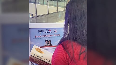 A YOUNG girl donates books at the drop-off point in SM City San Jose del Monte in Bulacan.