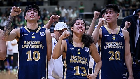 STEVE Nash Enriquez (middle) breaks down in tears after the NU Bulldogs suffer a 73-78 loss to the La Salle Green Archers in the Final Four of Season 88 UAAP men’s basketball tournament last Saturday.