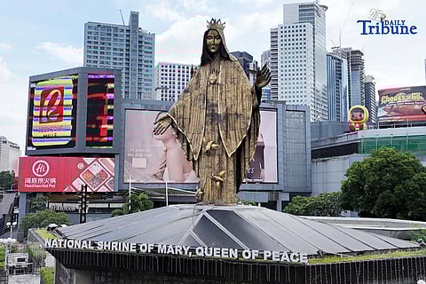 (December 07 2025) The 35-foot bronze sculpture of the Our Lady of EDSA situated on top of the National Shrine of Mary, Queen of Peace, also known as the EDSA Shrine, towers over the busy thoroughfare at the corner of EDSA and Ortigas Avenue in Quezon City on Sunday as the country is set to celebrate the Feast of the Immaculate Conception of Mary on December 8, which is a special non-working holiday declared by the government. Photo/Analy Labor