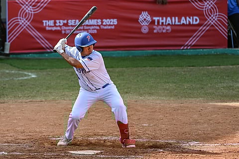 RAZSHLEY Santos and the Filipinos make short of Malaysia in the men's baseball event of the 33rd Southeast Asian Games. 