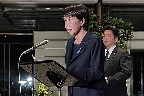 Japan's Prime Minister Sanae Takaichi addresses the media in Tokyo on December 8, 2025, after a 7.6 magnitude earthquake. A major quake rocked Japan's northern coast on December 8, with the country's meteorological agency recording two 40-centimetre tsunami waves and local media reporting injuries.