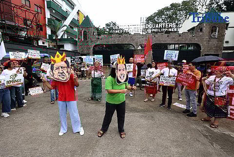 Militant and Indigenous groups stage a protest along EDSA outside Camp Aguinaldo in Quezon City on Monday, December 8, 2025, to mark Indigenous Peoples and Moro Human Rights Day. The groups called for action on alleged intensifying human rights violations, corruption scandals, and the funneling of AFP, NTF-ELCAC, and Barangay Development Program funds into militarization and CAFGU operations—amid rising reports of enforced disappearances, killings and political persecution.