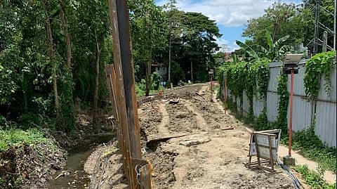 ONGOING BIKE LANE WORK. Construction of the bike lane along the reclaimed and backfilled portion of the creek in Jaro, Iloilo City, is a development that the DENR earlier linked to the flooding that swamped five nearby barangays after recent rains.