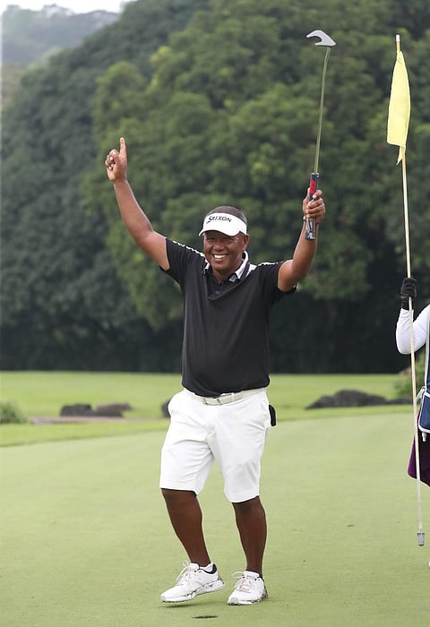 ANTONIO Lascuña celebrates his victory at Stronghold Insurance Senior Open at Hallow Ridge golf course in San Pedro, Laguna on Wednesday. 