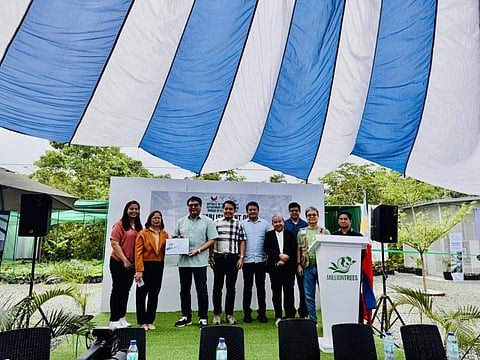 Million Trees Foundation President Melandrew Velasco officially receives from BPI Asst. Director Herminigilda Gabertan the Bureau of Plant Industry’s Indoor Cultivation System turnover certificate to the foundation at the Million Trees Nursery and Eco Learning Center at the La Mesa Watershed in Quezon City. In the photo are (L-R): BPI Chief for Engineering Elaiza Nicole Dotimas, Asst Director Gabertan, MTFI President Mel Velasco, Rotary DGE Rhyan Virrey, QC Brgy. Greater Lagro Captain Leo Garra, QC Joy of Urban Farming Chief Cristina Perez, MWSS Deputy Administrator Ryan Ayson and Maynilad VP Roel Espiritu. 