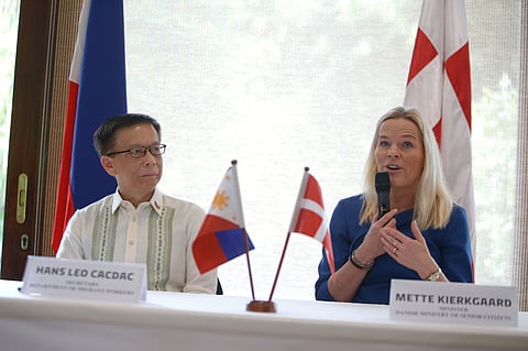 DEPARTMENT of Migrant Workers Secretary Hans Cacdac and Danish Minister for Senior Citizens Mette Kierkgaard sign a new bilateral program to recruit Filipino care workers during a briefing in Makati City on Thursday. 