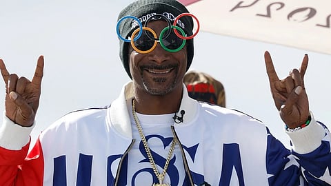 Rapper and entertainment mogul Snoop Dogg is introduced as Team USA’s first-ever honorary coach for the Milano Cortina 2026 Winter Olympics, joining the USOPC’s “Team Behind the Team” to help boost athlete morale.
