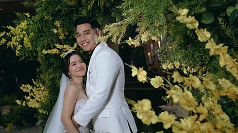 Celis and  Estopia exchanged I do's at the Shrine of St. Therese at Newport