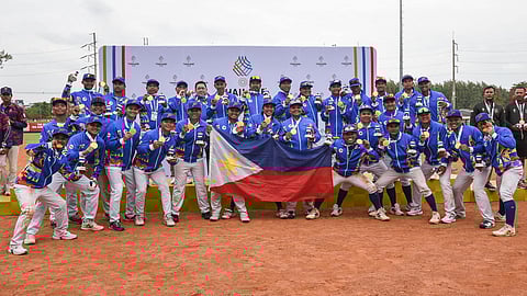 THE triumphant Philippine baseball team strikes a pose after beating host Thailand, 5-3, for the gold medal on Friday in the 33rd SEA Games.
