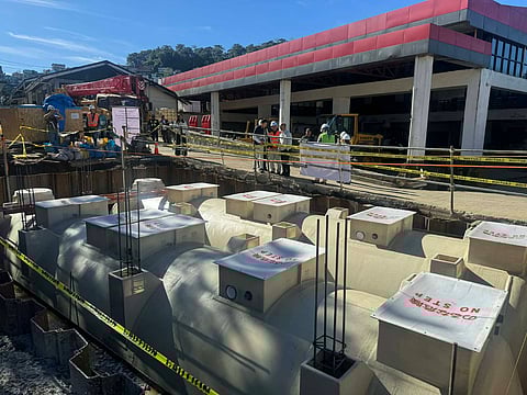 BAGUIO City officials, led by Mayor Benjamin Magalong, together with representatives from the Japan International Cooperation Agency and FujiClean Company, Ltd., inspect a pilot decentralized sewage treatment plant installed at the City Engineering Office grounds.