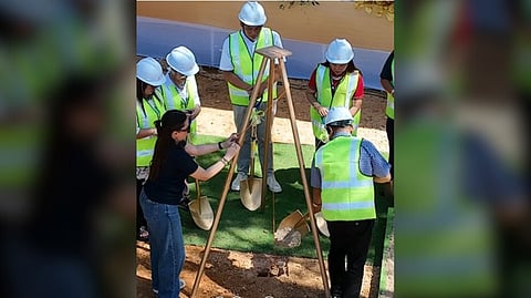 DENR 8 regional executive director Arturo Salazar (right) leads the ceremonial time-capsule laying for the Guiuan MSRS in a 1,796-square-meter site of Barangay Baras. 