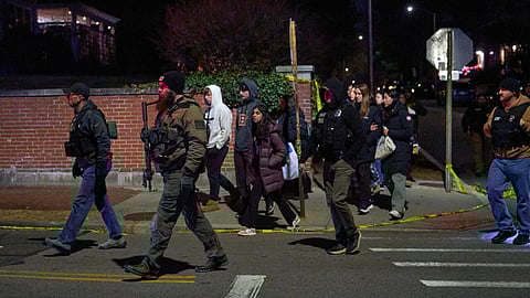 Police hunt gunman who killed two at U.S. university