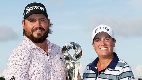 ANDREW Novak and Lauren Coughlin celebrate after winning the PGA and LPGA Grant Thornton Invitational pairs tournament at the Tiburon Golf Club in Florida.      