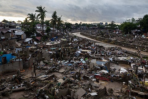 CEBU, left in shambles after the heavy rains and floods of Typhoon Tino.
