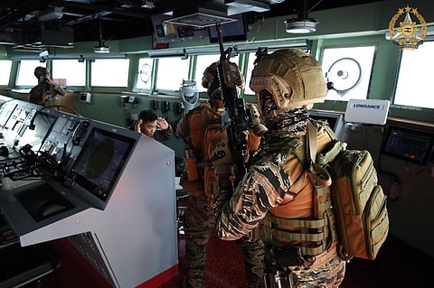 PHILIPPINE Navy conducts a Visit, Board, Search, and Seizure (VBSS), demonstrating coordinated maritime law enforcement procedures.