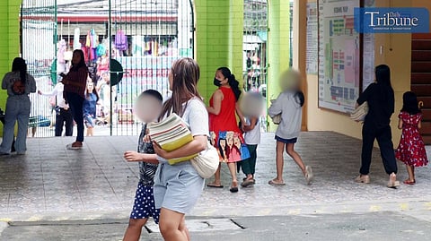 LOOK: A day before the start of the new school year at Bagong Silangan Elementary School in Quezon City, teachers and parents are seen making last-minute preparations inside the classrooms on Sunday, 28 July 2024.  