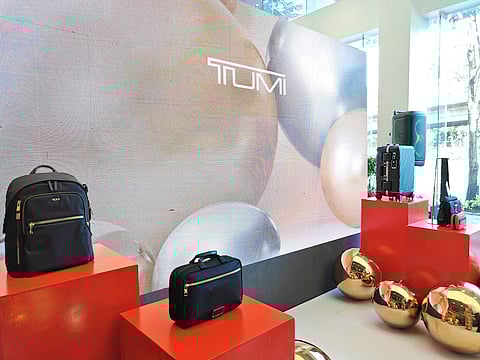TUMI bags displayed during the event, showcasing the brand’s stylish and functional designs perfect for holiday travel.