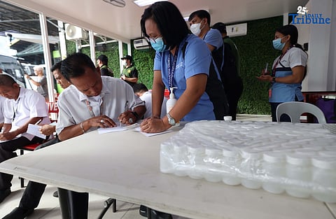 A provincial bus driver undergoes a random drug test conducted by the Philippine Drug Enforcement Agency during a joint inspection of bus terminals by the Metropolitan Manila Development Authority, Department of Transportation, Land Transportation Office, and Land Transportation Franchising and Regulatory Board in Cubao, Quezon City. The inter-agency operation is part of efforts to manage heavy holiday passenger volume and ensure commuter safety.
