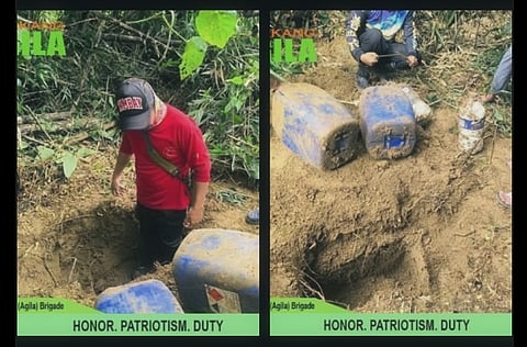 Troops from the 703rd Infantry Brigade uncover a hidden food cache belonging to communist insurgents in Aurora, 15 December.