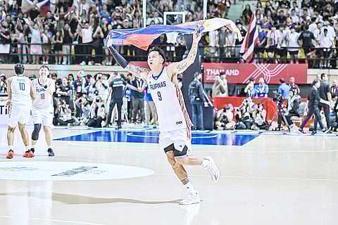 POY Erram celebrates shortly after Gilas Pilipinas posted a 70-64 win over Thailand to win the gold medal of the 5-on-5 basketball event of the 33rd Southeast Asian Games in Bangkok.  