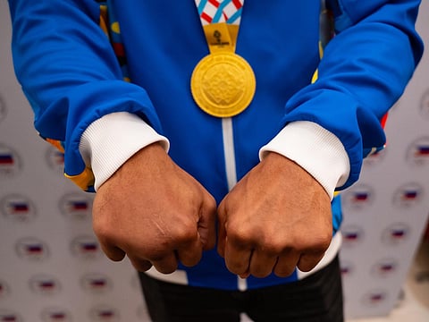 EUMIR Marcial's hands that gave him his fifth Southeast Asian Games gold medal in his bout, even though strings of storms came to challenge him. 