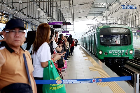 Passengers, including private sector employees and household helpers, avail of free rides at LRT-2 Antipolo Station in Antipolo, Rizal, on Tuesday, 23 December 2025. The Department of Transportation (DOTr) continues its 12 Days of Christmas free-ride program on MRT-3, LRT-1, and LRT-2 for select groups of passengers during the holiday period. Private sector workers and household helpers may avail themselves of complimentary rides on 23 December, followed by uniformed personnel, veterans, and their families on 24 December. Free rides will be extended to all commuters on 25 December.