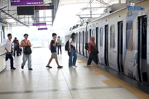 (December 23 2025) Passengers from private sector employees and house helpers avail free rides at the LRT-2 in Antipolo Station in Antipolo, Rizal, on Tuesday, December 23, 2025. The Department of Transportation (DOTr) continue its free-ride program 12 days of Christmas on the MRT-3, LRT-1, and LRT-2 for select groups of passengers during the holiday period. Private sector workers and household helpers may avail themselves of complimentary rides on December 23, followed by uniformed personnel, veterans, and their families on December 24. Free rides will be extended to all commuters on December 25. Photo/Analy Labor