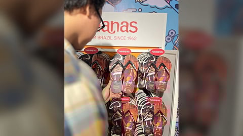 ‘I’M going to throw these flip-flops in the trash.’