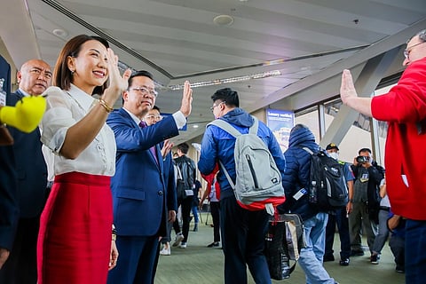 Tourism Secretary Christina Garcia Frasco and former Chinese Ambassador to the Philippines Huang Xilian welcomes Chinese tourists in NAIA. 
