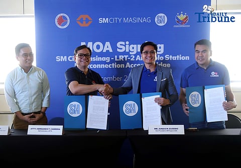 (December 23 2025) Light Rail Transit Authority Administrator LRTA Administrator Atty. Hernando Cabrera with SM Supermalls Vice President Junias Eusebio leads the ceremonial signing of a memorandum of agreement (MOA) for the SM City Masinag–LRT-2 Antipolo, the signing of the Memorandum of Agreement (MOA) for the SM City Masinag–LRT-2 Antipolo Station Interconnection Access Bridge, formalizing the partnership between the Light Rail Transit Authority and SM City Masinag to deliver a safe, direct, and weather-protected pedestrian link for commuters and shoppers in the East Metro area. Photo/Analy Labor
