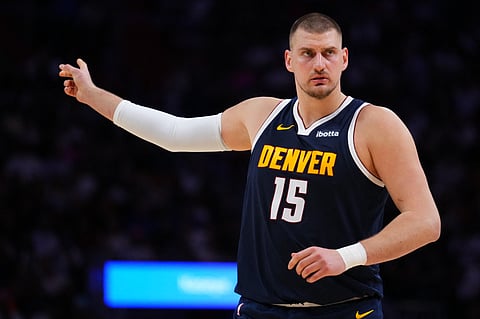 Nikola Jokic #15 of the Denver Nuggets calls a play against the Miami Heat during the second quarter at Kaseya Center on December 29, 2025 in Miami, Florida. 