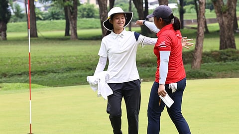 BLAIR Uyking congratulates Lisa Sarines who won their title showdown for the Philippine Amateur title at Apo Golf and Country Club in Davao a few months ago. They renew their rivalry in the JGFP Mindanao Open set to start on Sunday.