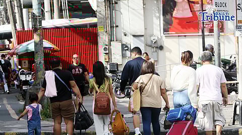 Individuals carrying their belongings walked to bus stations along EDSA in Cubao, Quezon City, on Saturday, 03 January 2026, to catch rides to their respective provinces after spending the long Christmas and New Year break in Metro Manila.