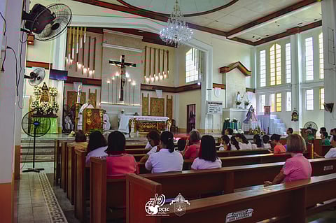 PARISHIONERS A flashback to faith and tradition in Mogpog, Marinduque every 13 May.