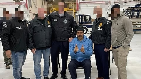 PHOTO releases by the US government show captured Venezuelan President Nicolás Maduro flashing a thumbs-up while handcuffed and surrounded by law enforcement officers following his arrest — a striking image that underscores the dramatic fall of a once-powerful leader.