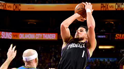 DEVIN Booker of Phoenix drains the game-winning triple in the Suns’ 108-105 triumph over Oklahoma City in the NBA.  