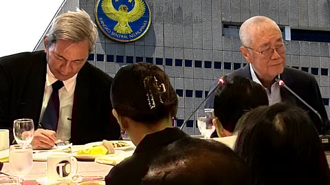 BANGKO Sentral ng Pilipinas Governor Eli M. Remolona Jr. (right) speaks to reporters following his appearance at the Tuesday Club's first meeting for 2026 on 6 January at EDSA Shangri-La. To his left is Albay Rep. and House Committee on Ways and Means chairman Joey Salceda.