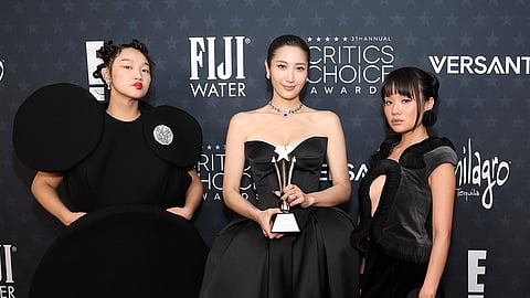 Audrey Nuna, EJAE, and Rei Ami arrive at the 31st Annual Critics Choice Awards, the trio behind the singing voices of Huntrix, the fictional K-pop girl group at the center of KPop Demon Hunters. | AFP