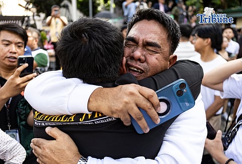 Bar takers, accompanied by their family and friends, react during the release day of the 2025 Bar Examinations at Supreme Court in Manila on Wednesday, 7 January 2026. A total of 5,594 out of 11,420 examinees passed this year, with a passing rate of 48.98%. | John Carlo Magallon